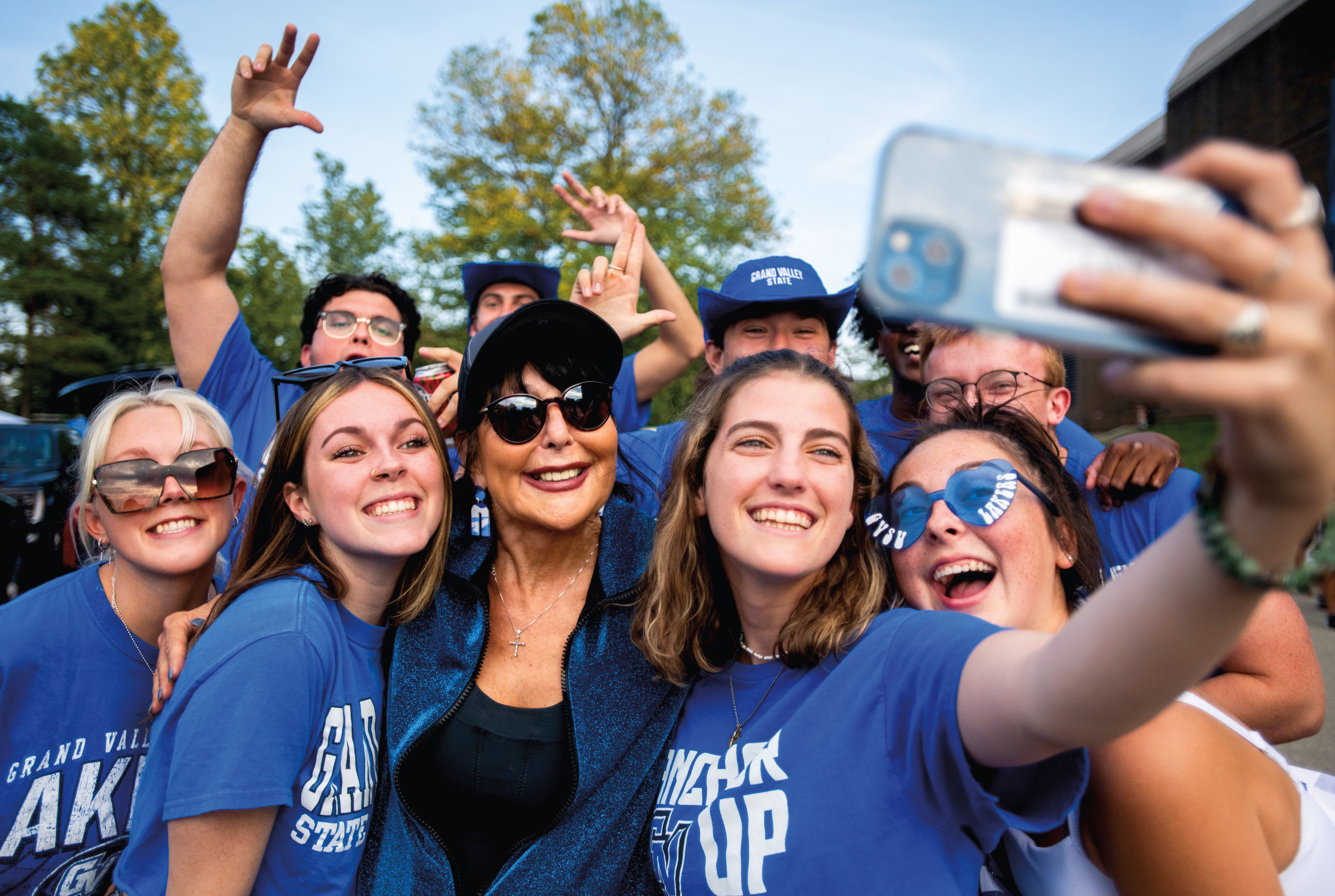 President Philomena V. Mantella greets students prior to a home football game during Family Weekend in 2022. 