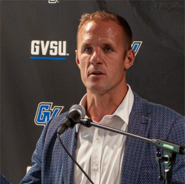 R.J. Boudro addresses the crowd during his news conference naming him as the Lakers' new wrestling coach.