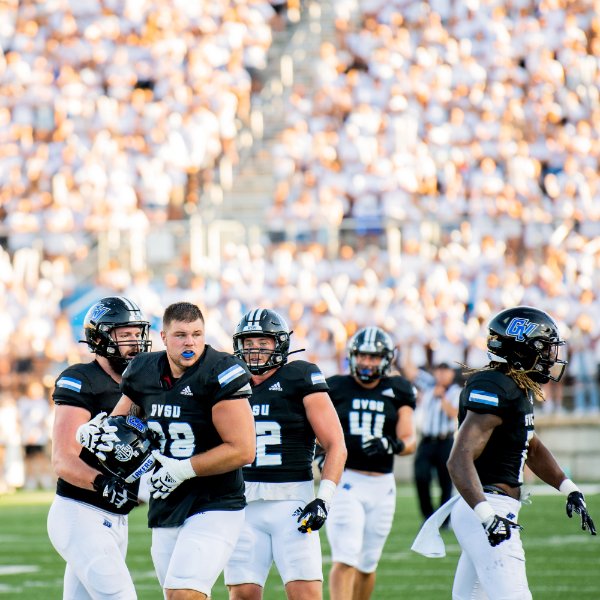 Members of the Grand Valley football team on the field