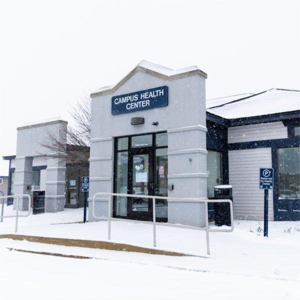 exterior of the Campus Health Center with snow on ground