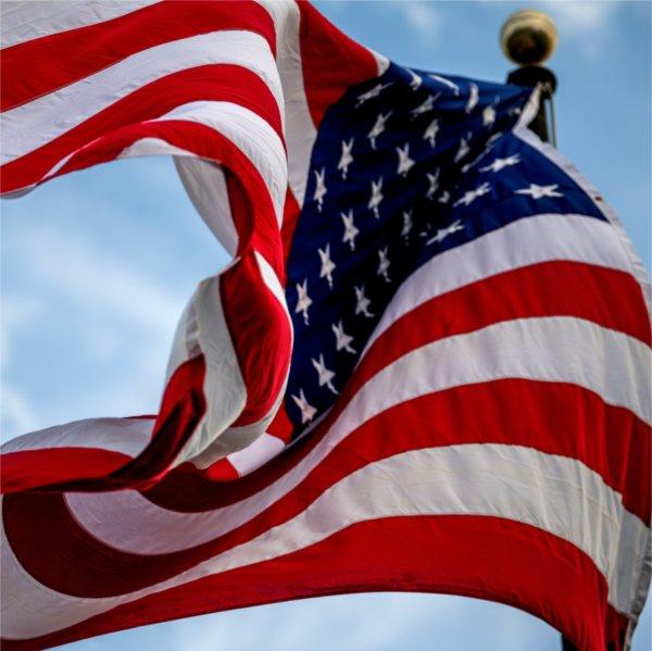 United States flag flying at Grand Valley football game