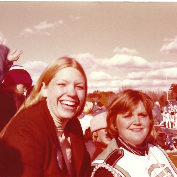 two band members in a 1978 photo, sepia toned