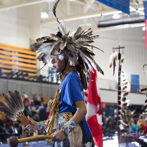 A photo of a person participating in the annual Pow Wow at Grand Valley.