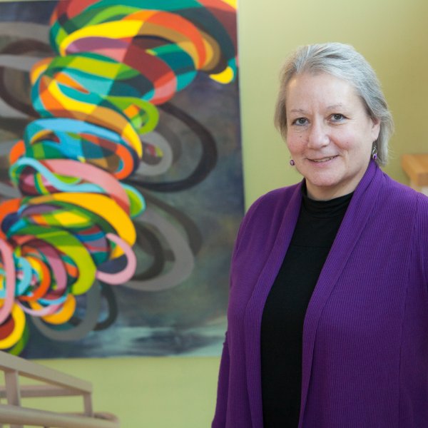 Teri Behrens, executive director of the Dorothy A. Johnson Center for Philanthropy, smiles for a photo.