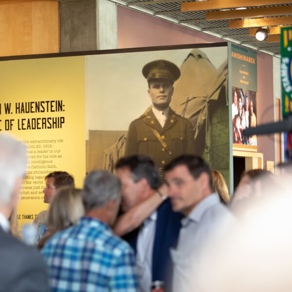 A crowd previews the Ralph Hauenstein exhibit at the Grand Rapids Public Museum.