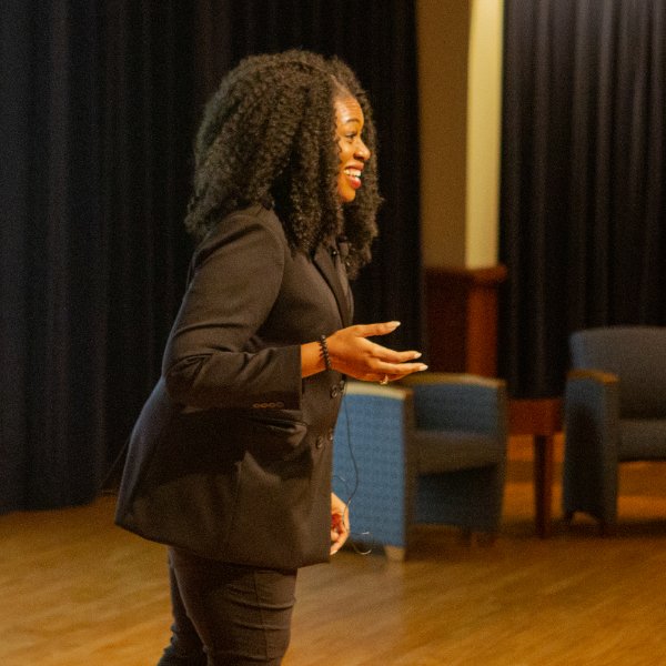 Brandy Lovelady Mitchell presents the keynote speech during a conference for students.