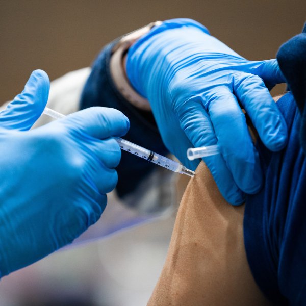 Person getting a COVID-19 vaccine.