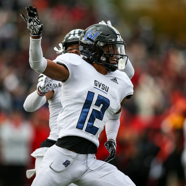 Grand Valley football player celebrates with teammate