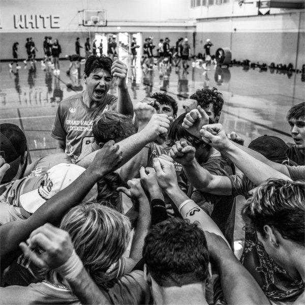 The GVSU Dodgeball team huddles up before taking the court against Michigan State University.