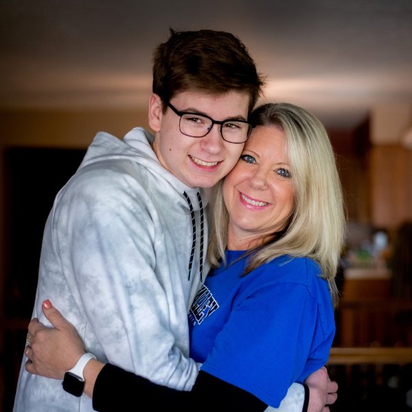 Sam Smalldon hugging his mother, Jill Smalldon
