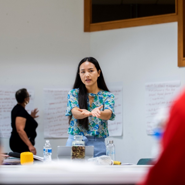 Jenifer Pui, education engagement program administrator at GVSU's Burma Center, conducts a session with students during a REP4 conference in 2021.