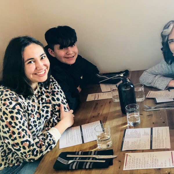 family of four at table in a restaurant