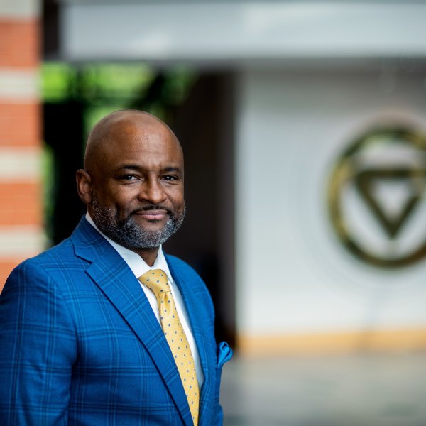 Donta Truss pictured outside for a portrait, circle GV in background