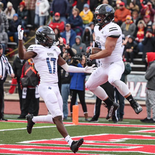Grand Valley football players celebrate a big play.