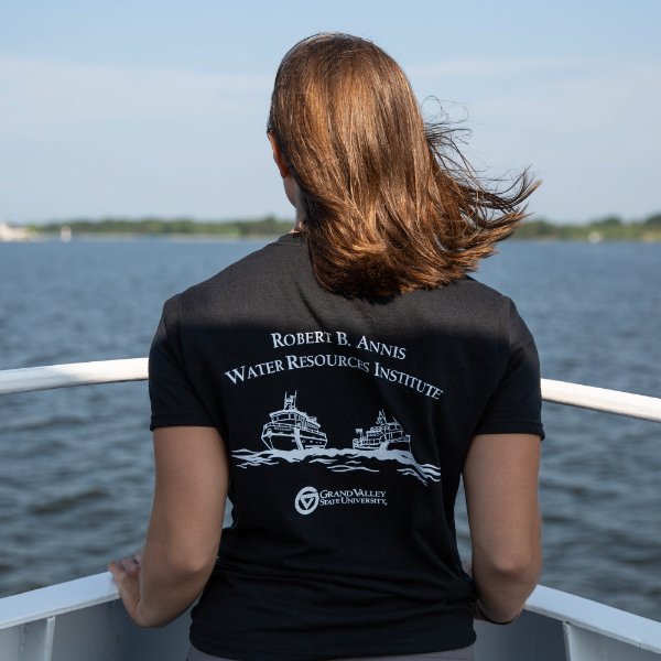 GVSU student looking out onto Muskegon Lake.