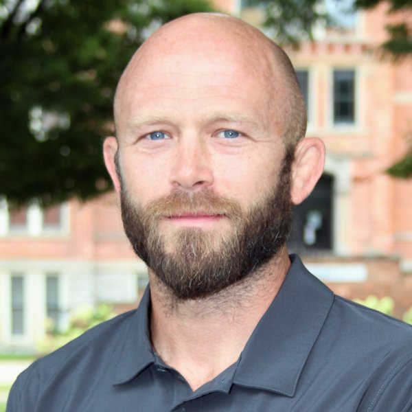 GVSU wrestling coach Joey Simcoe poses for a photo.
