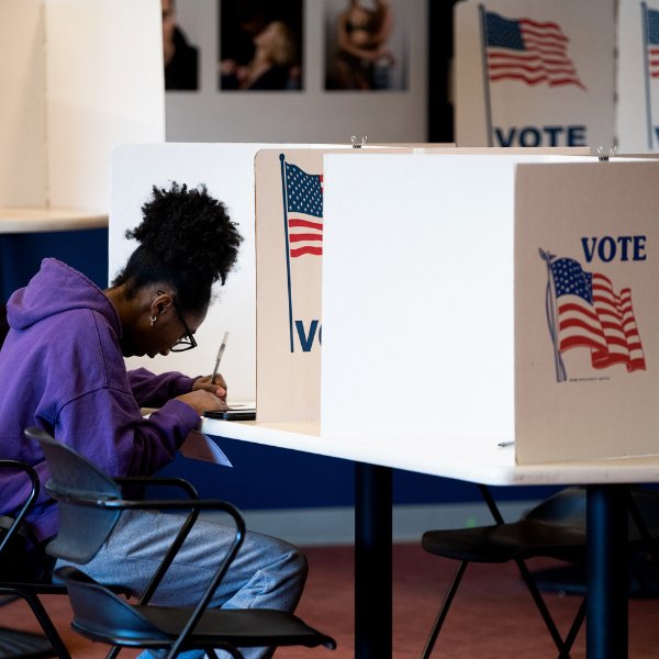 A student votes in the midterm election at Grand Valley's satellite office.