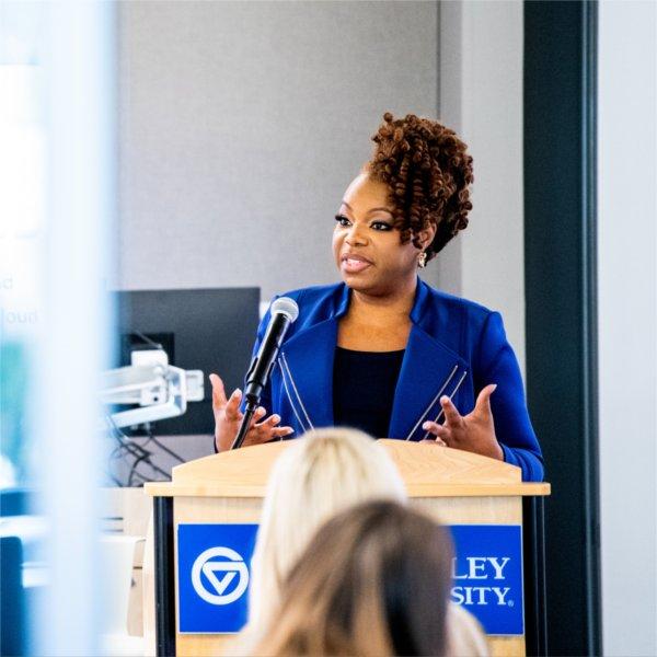 Diya Wynn, Amazon Web Services� lead of responsible AI, delivers her keynote address during the Women of the Cloud conference.