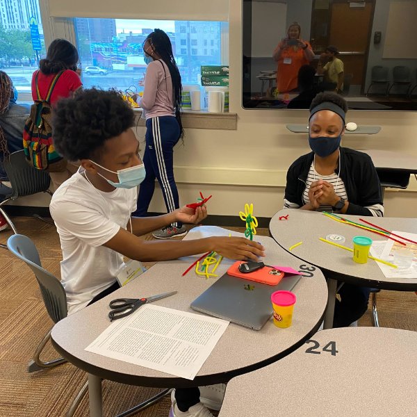 Students working at a table.