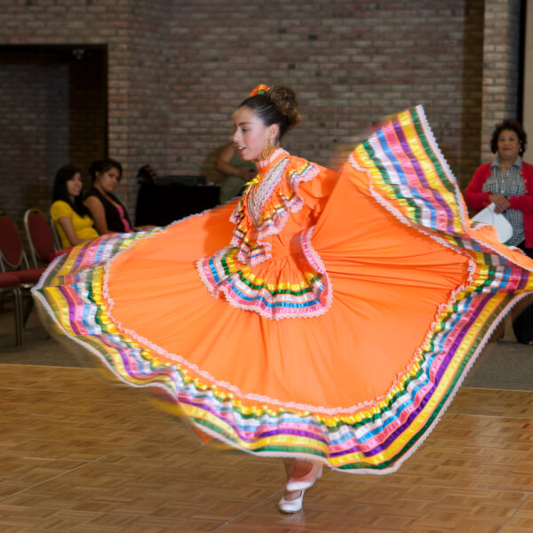 A photo of a woman performing a dance.