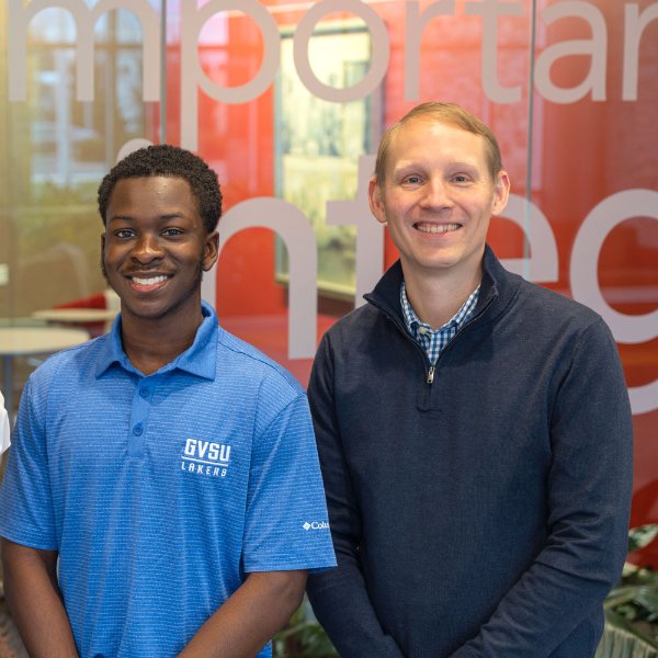 two people pictured standing next to each other with arms in front: Jourdan Watson and Ben Nanninga