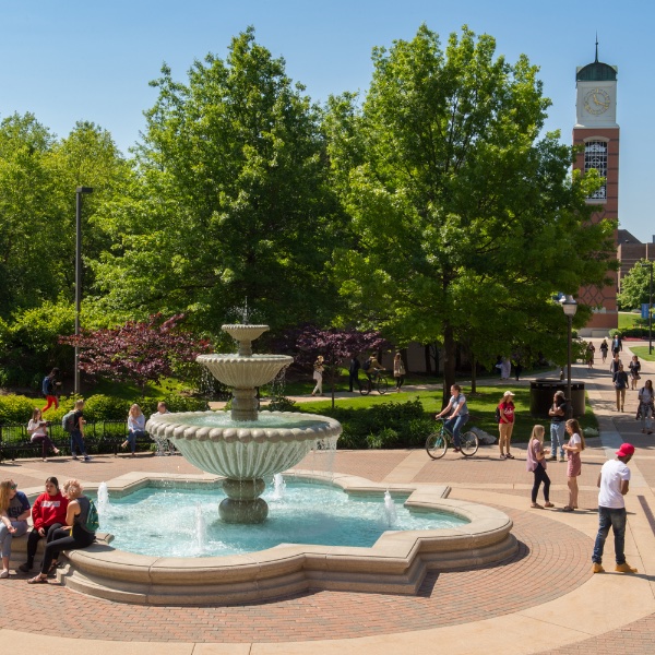 Students around the fountain outside the Student Service building.
