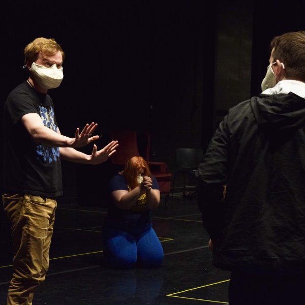 Cast members rehearse a scene from "Ernest Maltravers"