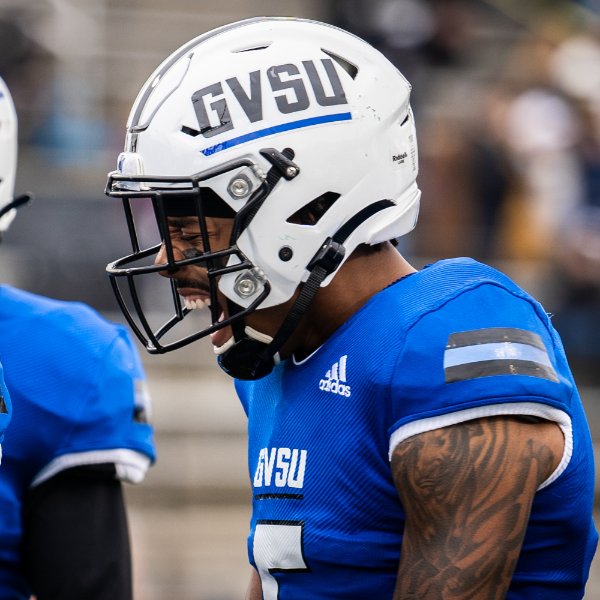Grand Valley football player yells in excitement