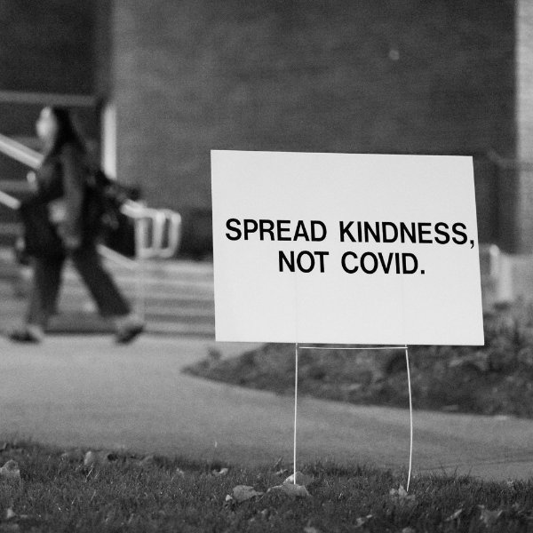Sign on campus that says Spread Kindness, not COVID.