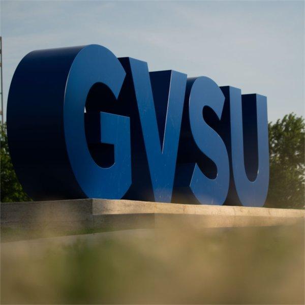 A sculpture spelling out GVSU on the Allendale campus