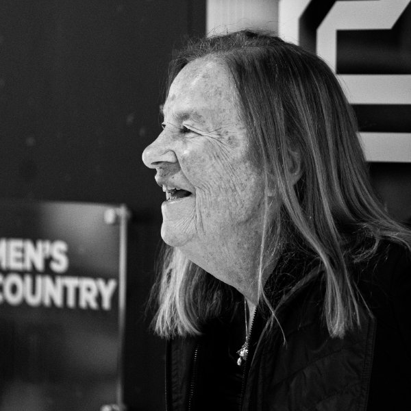 Joan Boand smiles for a photo during dedication of the Joan Boand Wall of National Champions dedication.