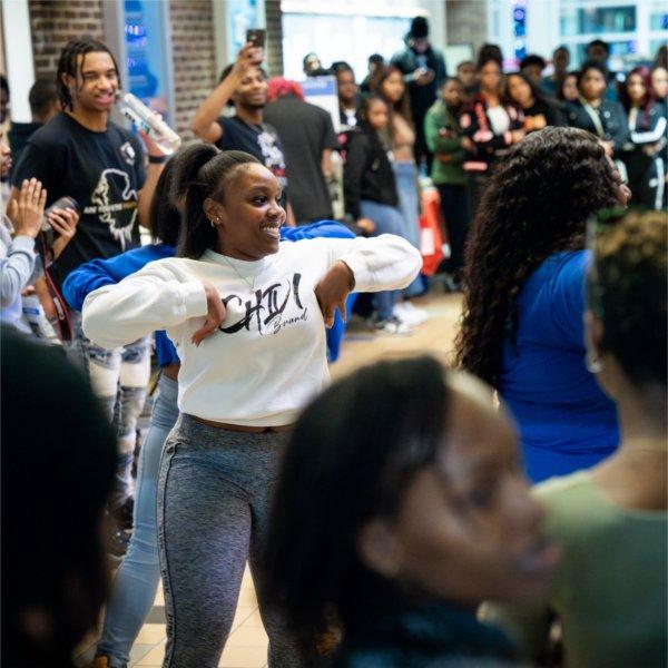 A group of students dances during Grand Valley's "The Blackout: Black Student Organization Showcase".