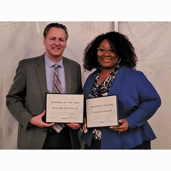 Chris Plouff and Crystal Scott-Tunstall hold their WMEAC awards