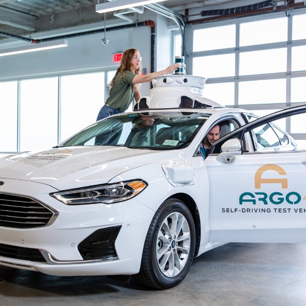 Engineer works with self-driving vehicle