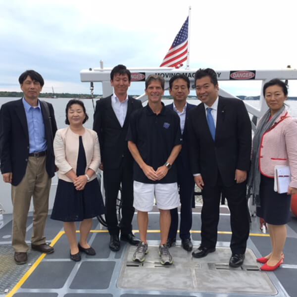 Alan Steinman, center, with a delegation of officials from the Shiga Prefectural Assembly.