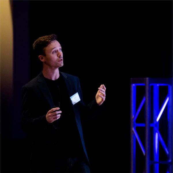 Computing assistant professor Paul Fink speaks during the Tech Talk