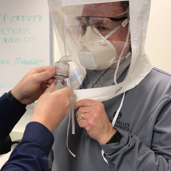 A qualitative fit test is done to ensure proper fit of a respirator, a key piece of personal protective equipment.