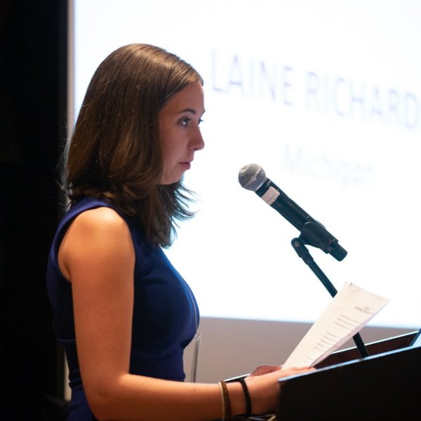 Student speaking at podium