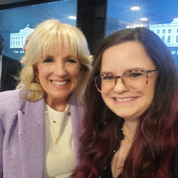 Dr. Jill Biden and Theresann Pyrett pose for a photo.