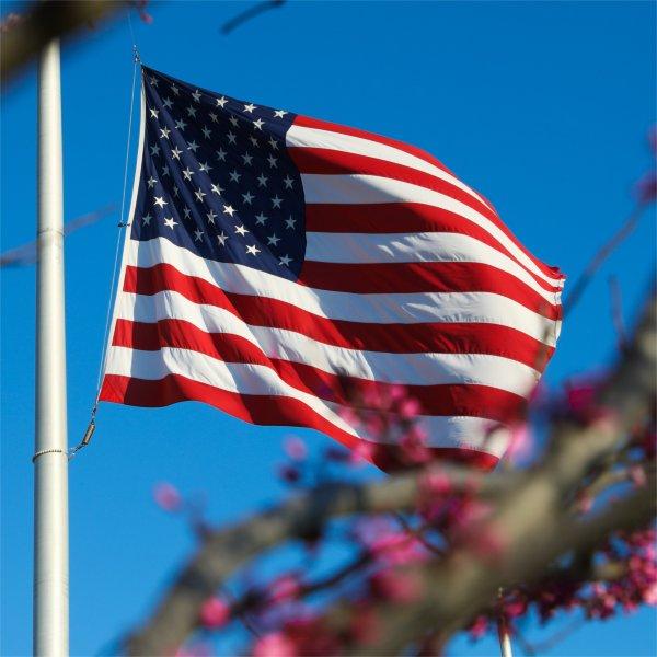 An American flag flies outside the Lubbers Student Service Center.