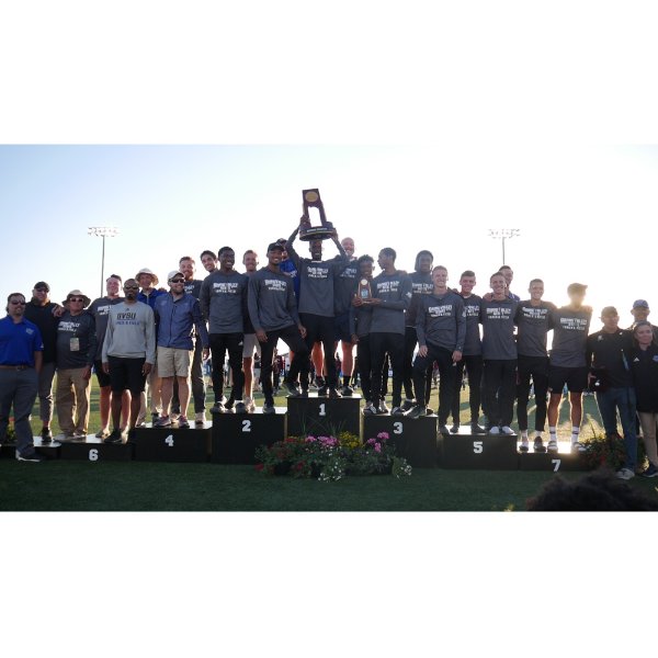 members of the Laker men's track and field team stand with the first-place NCAA national championship trophy