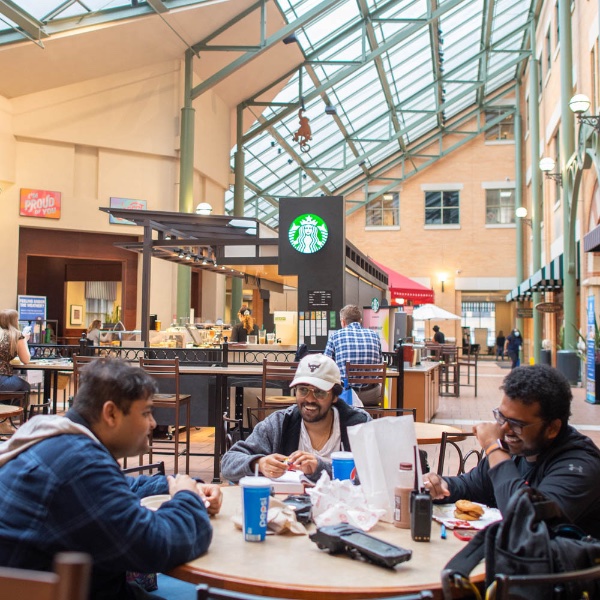 Students enjoying the DeVos Center Plaza at GVSU's Pew Campus