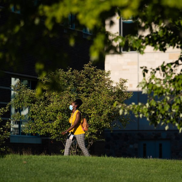 Student walking on Allendale Campus.