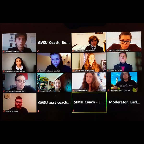 Zoom gallery photo of the Grand Valley Ethics Bowl team competing in a competition are pictured.