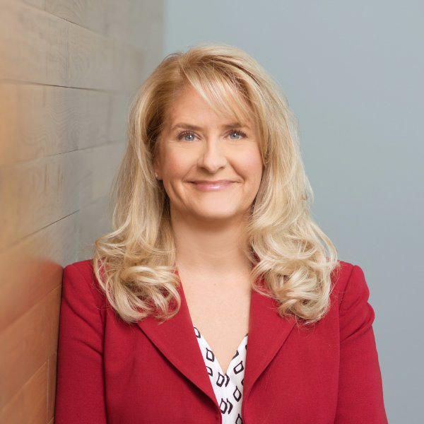 Stacie R. Behler smiles in a posed portrait.