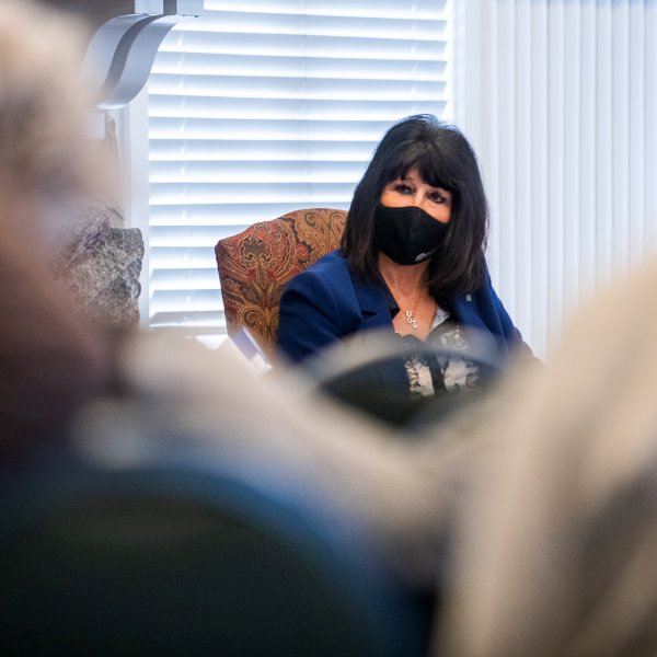 President Philomena V. Mantella listens intently to the discussion during a Fireside Chat.