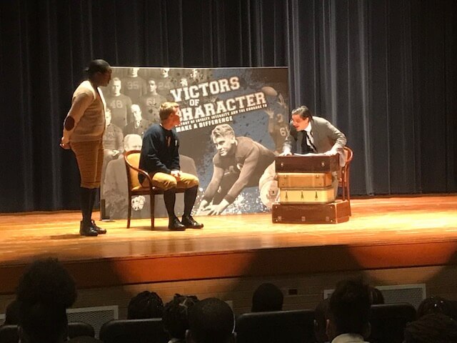 A scene from "Victors of Character."