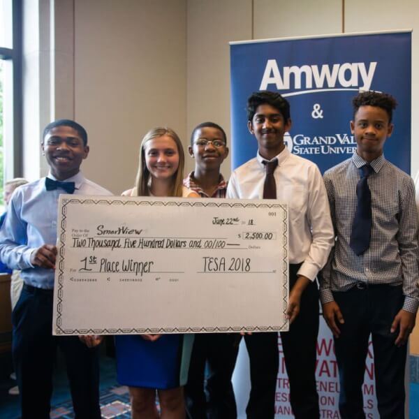 A group photo of the five students who won the 2018 TESA competition.