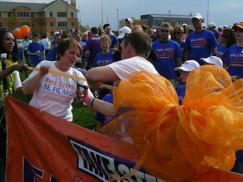 Special Assistant to the President Teri Losey, nursing student and event organizer Justin Gray and others initiate the event last year.