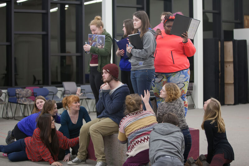 The cast of "Helen" performing during a rehearsal.